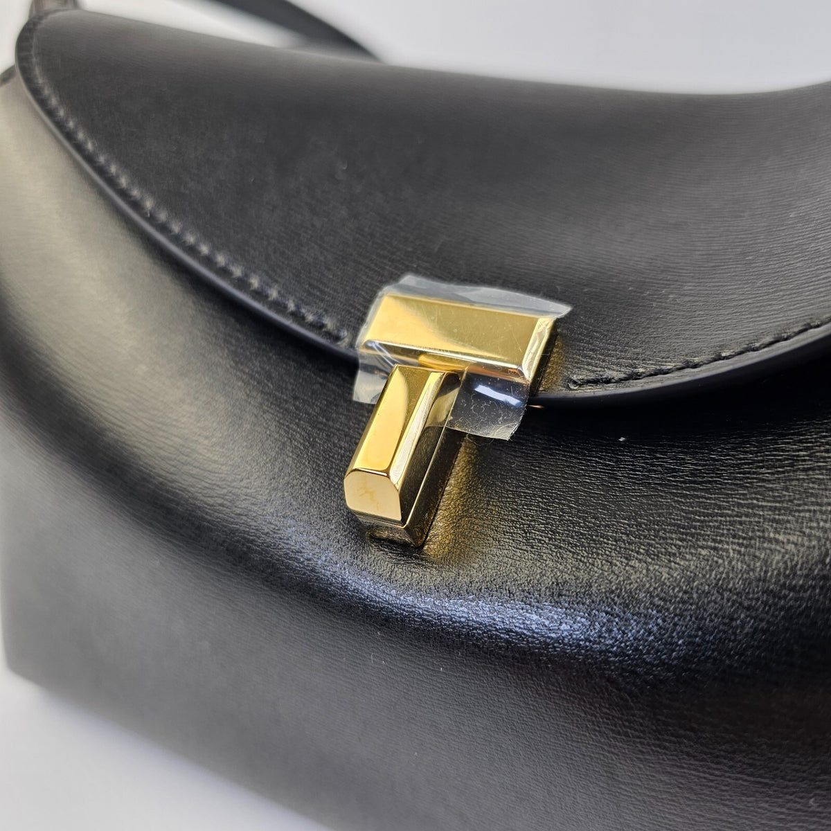 TOTEME T-Lock Black/Gold Leather Clutch New