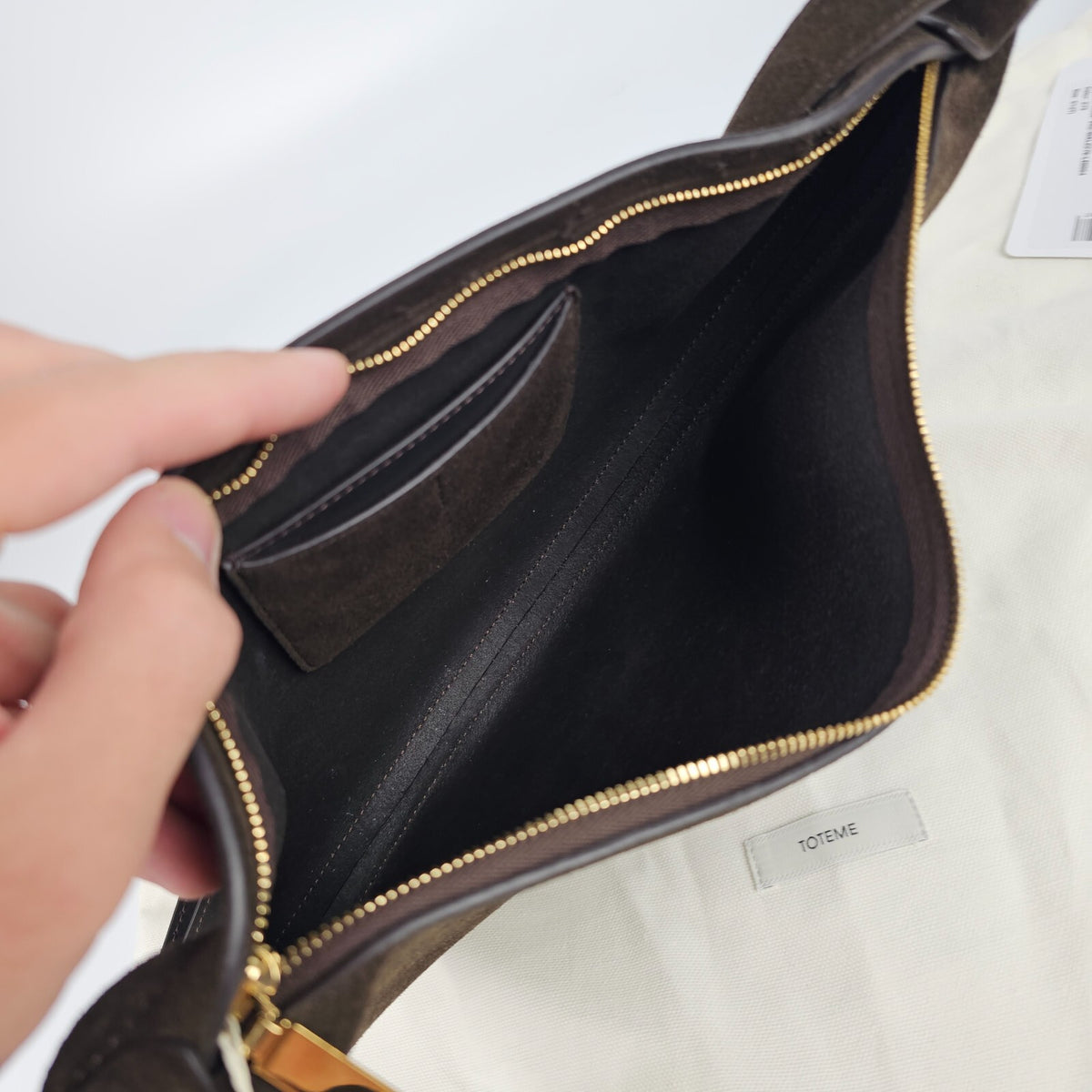 TOTEME Scooped Sling $890 Pepper Suede Shoulder Bag