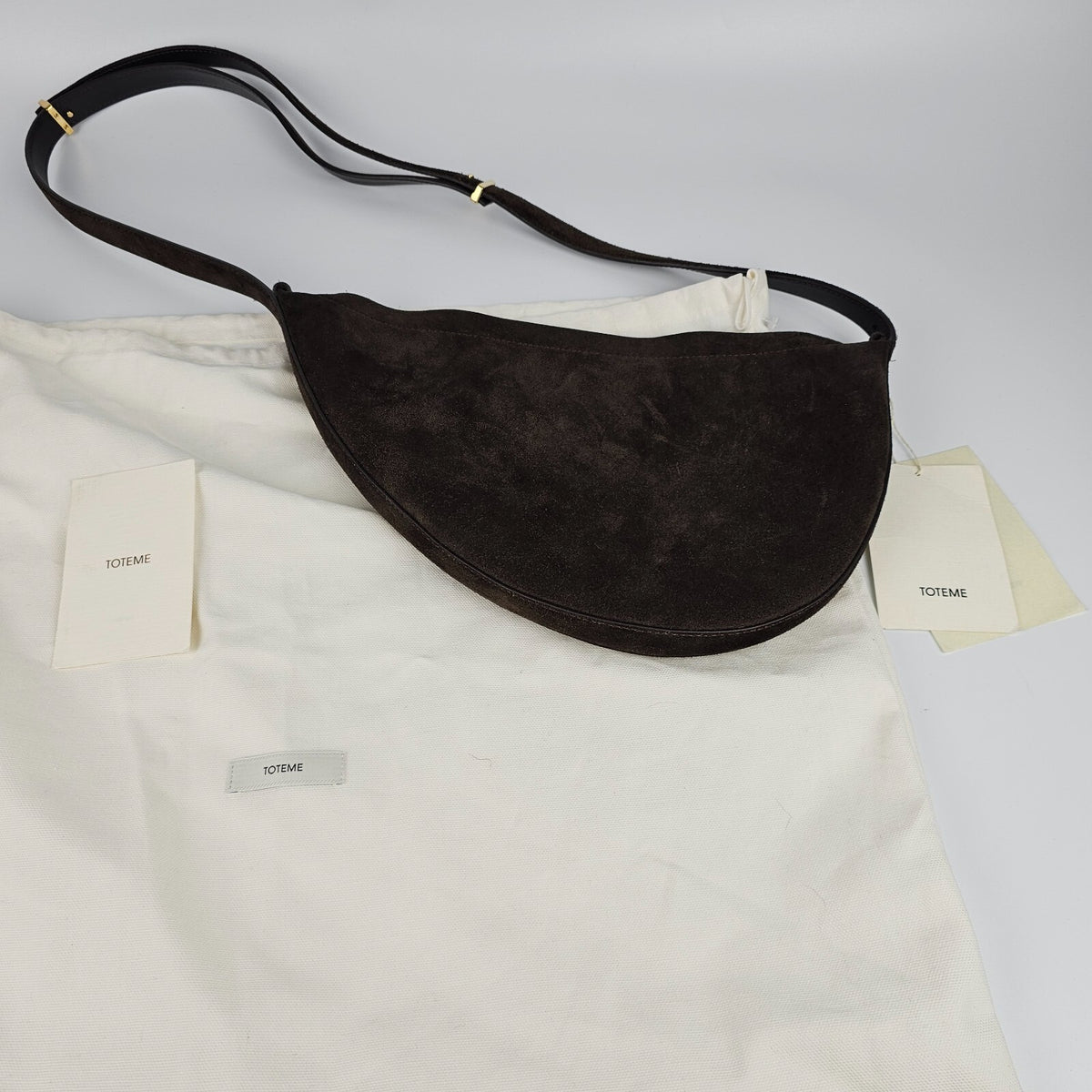 TOTEME Scooped Sling $890 Pepper Suede Shoulder Bag