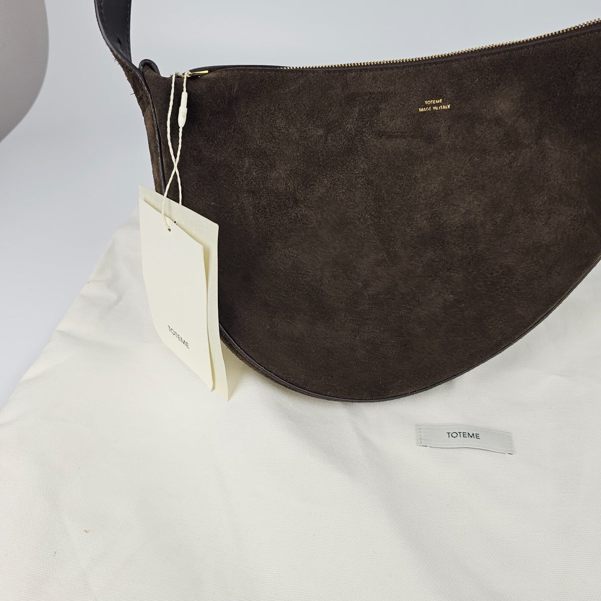 TOTEME Scooped Sling $890 Pepper Suede Shoulder Bag